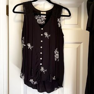 Black top with floral pattern